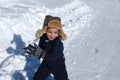 Cute little boy playing in the snow outdoors. Royalty Free Stock Photo