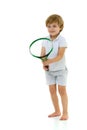 Cute little boy playing tennis. Royalty Free Stock Photo