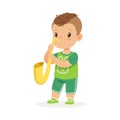 Cute little boy playing trumpet, young musician with toy musical instrument, musical education for kids cartoon vector Royalty Free Stock Photo