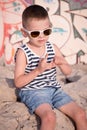 Cute little boy pulls out a splinter from his finger Royalty Free Stock Photo