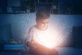 Cute little boy reading book at home Royalty Free Stock Photo