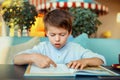 Cute little boy reading book Royalty Free Stock Photo