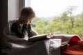 Cute little boy reading book Royalty Free Stock Photo