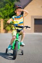 Cute little boy riding bicycle Royalty Free Stock Photo
