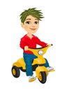 Cute little boy riding a tricycle