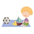 Cute little boy with sailboat and toys Royalty Free Stock Photo