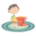 Cute little boy with sand bucket and ducky Royalty Free Stock Photo