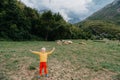 Cute little boy with a sheeps on farm, best friends, boy and lamb against the backdrop of greenery, poddy and child on Royalty Free Stock Photo