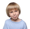 Cute little boy showing his tongue on white background Royalty Free Stock Photo