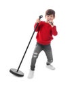 Cute little boy singing into microphone Royalty Free Stock Photo