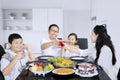 Little boy toasting glasses with his family Royalty Free Stock Photo