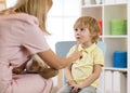 Cute little boy at speech therapist office Royalty Free Stock Photo