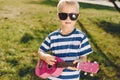 Cute little boy in a summer park Royalty Free Stock Photo