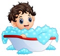 Cute little boy taking a bath on a white background Royalty Free Stock Photo