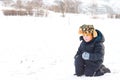 Cute little boy about to thow a snowball