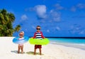 Cute little boy and toddler girl play on beach Royalty Free Stock Photo