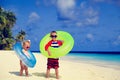 Cute little boy and toddler girl play on beach Royalty Free Stock Photo