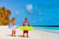 Cute little boy and toddler girl play on beach Royalty Free Stock Photo