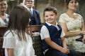 Cute little boy waiting for the bride to arrive Royalty Free Stock Photo