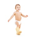 Cute little boy walking in big rubber boots Royalty Free Stock Photo