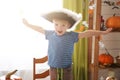 Cute little boy wearing pirate costume on Halloween trick or treat. Kids carving pumpkin lantern. Children celebrate Halloween in Royalty Free Stock Photo