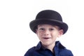 Cute little boy wit bowler hat