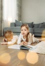 A cute little boy writes a letter to Santa Claus Royalty Free Stock Photo