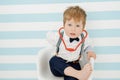 Cute Little Boy Young Doctor Using Toy Stethoscope Royalty Free Stock Photo