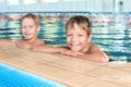 Cute little boys in indoor pool Royalty Free Stock Photo