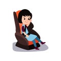 Cute little brunette girl sitting on a car seat wearing seat belt