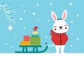 A cute little bunny carries a sled with gifts through a snowy forest