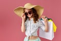 cute little caucasian child girl holds shopping bags Royalty Free Stock Photo