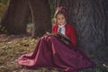 Cute little caucasian girl wearing retro clothes. Nice female child in beautiful vintage dress. Royalty Free Stock Photo