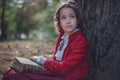 Cute little caucasian girl wearing retro clothes. Nice female child in beautiful vintage dress. Royalty Free Stock Photo