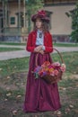 Cute little caucasian girl wearing retro clothes. Nice female child in beautiful vintage dress. Royalty Free Stock Photo