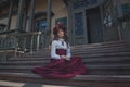 Cute little caucasian girl wearing retro clothes. Nice female child in beautiful vintage dress. Royalty Free Stock Photo