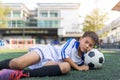 Cute little child dreams of becoming a soccer player. sport and activity concept