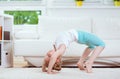 Cute little child girl making morning exercises at home Royalty Free Stock Photo