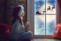 Girl by window at Christmas Royalty Free Stock Photo