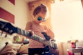 Cute little child girl in sunglasses playing guitar. Royalty Free Stock Photo