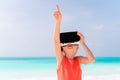 Kid wearing virtual reality glasses on beach Royalty Free Stock Photo