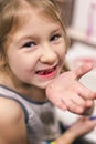 Cute little child has just lost the first milk tooth Royalty Free Stock Photo