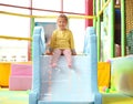 Cute little child playing at amusement park Royalty Free Stock Photo
