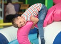 Cute little child playing at indoor park Royalty Free Stock Photo