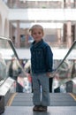 Cute little child in shopping center standing Royalty Free Stock Photo