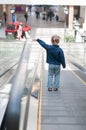 Cute little child in shopping center standing Royalty Free Stock Photo