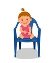 Cute little child sitting on the chair and smiling. Little girl in a pink dress Royalty Free Stock Photo