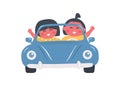 Cute little children in blue car. Kids smiles and waves their hands. Boy and Girl ride a retro car. Blue cabriolet Royalty Free Stock Photo