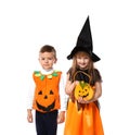 Cute little children dressed as witch and Jack-o-lantern for Halloween on white background