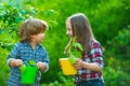 Cute little children enjoying on farm. Ecology concept child. Gardening with a kids.